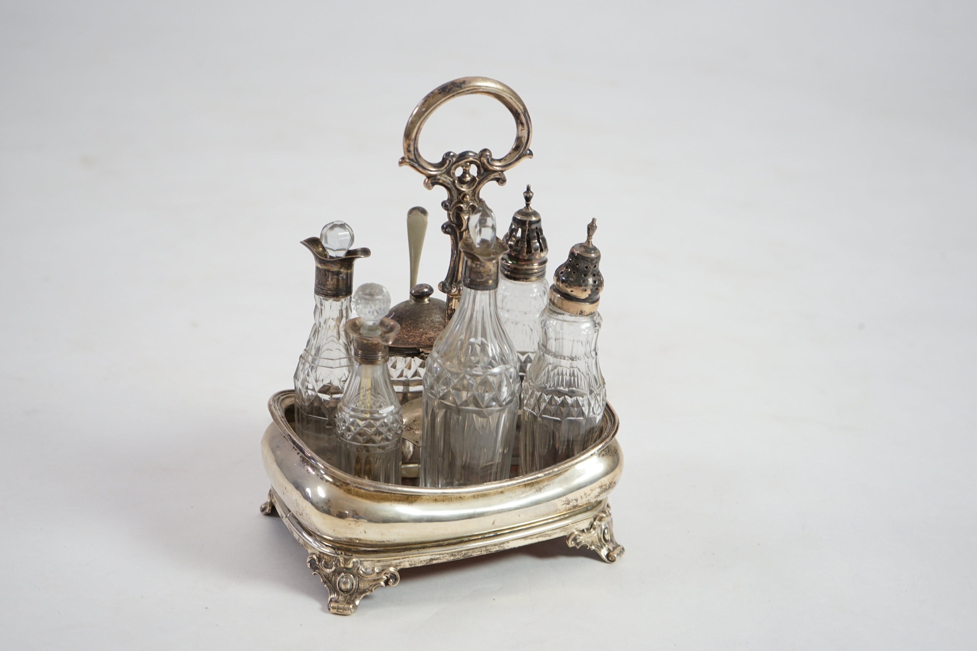 An early 19th century silver cruet stand